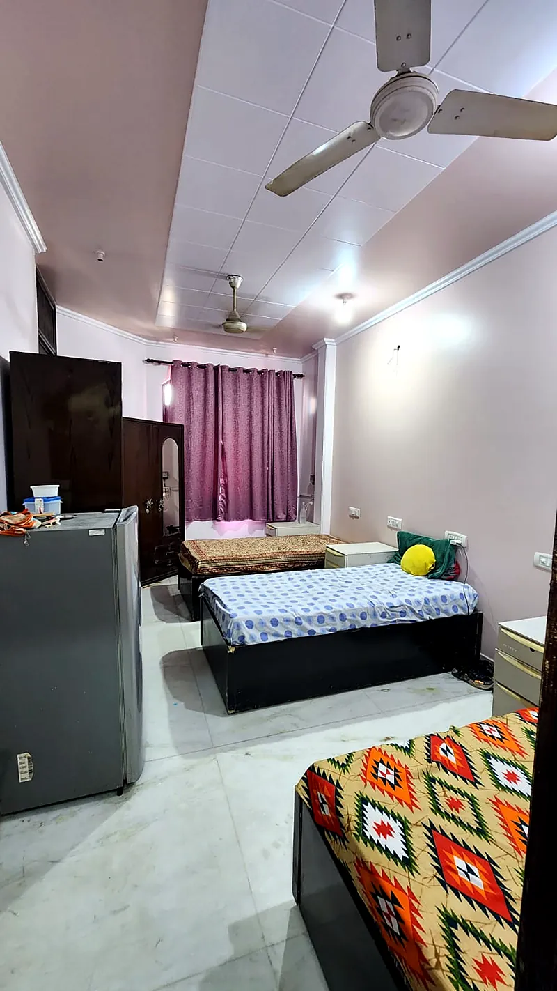 Room with fridge at PG for Girls in Rohini