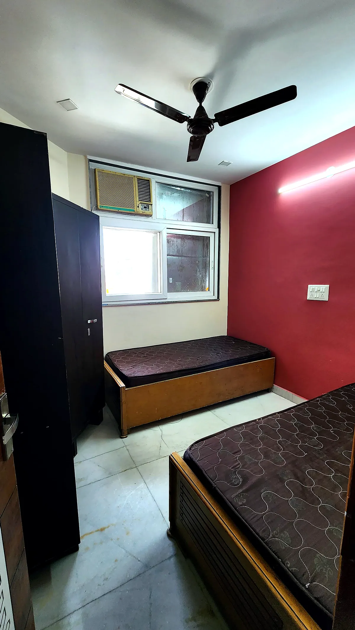 Room with AC and fan at PG for Girls in Rohini